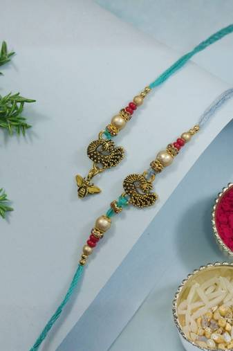 peacock designer lumba and rakhi set with roli chawal and raksha bandhan card