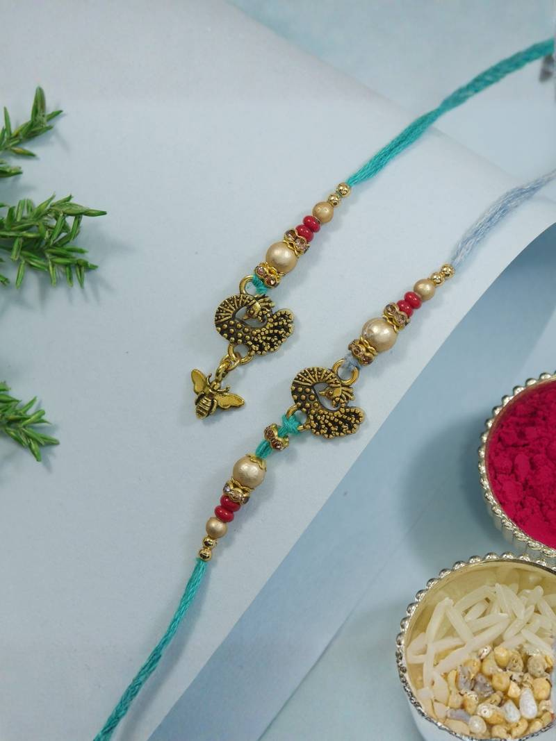 peacock designer lumba and rakhi set with roli chawal and raksha bandhan card