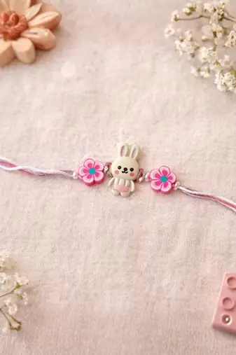 kids rakhi with roli chawal and raksha bandhan cards