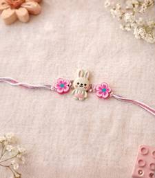 kids rakhi with roli chawal and raksha bandhan cards