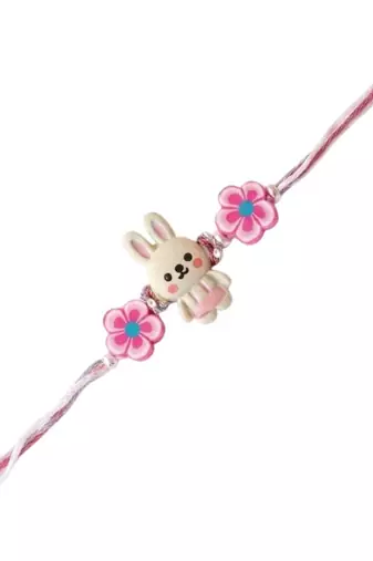 kids rakhi with roli chawal and raksha bandhan cards