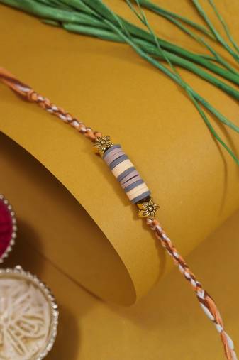 clay kids rakhi with roli chawal and raksha bandhan cards