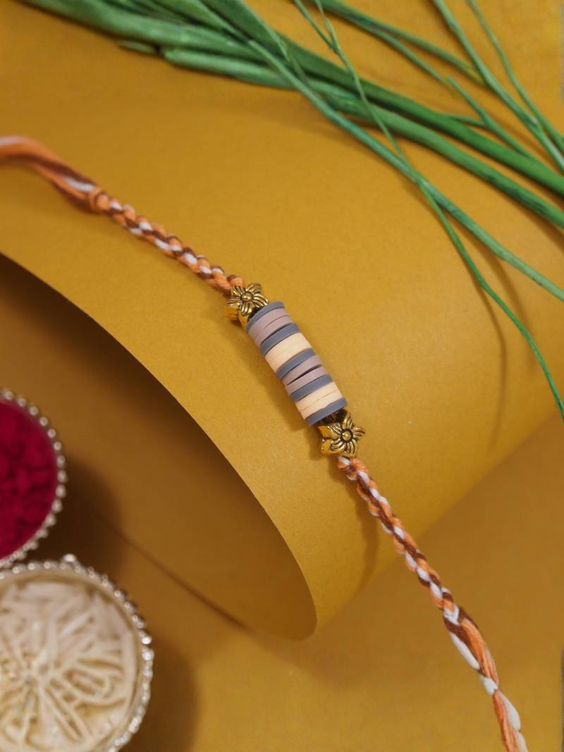 clay kids rakhi with roli chawal and raksha bandhan cards