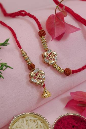 designer om rakhi with roli chawal and raksha bandhan cards