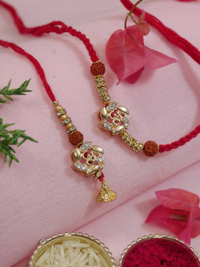 designer om rakhi with roli chawal and raksha bandhan cards
