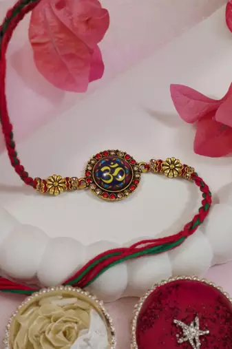 designer om rakhi with roli chawal and raksha bandhan cards