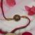 designer om rakhi with roli chawal and raksha bandhan cards