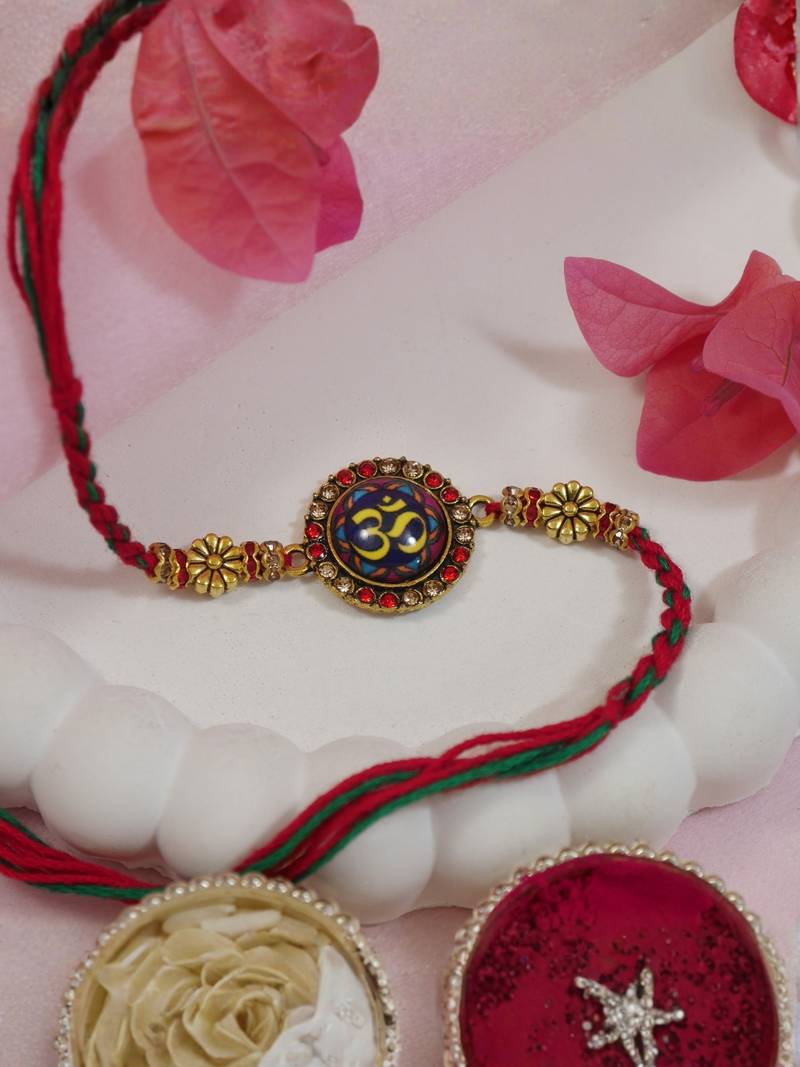 designer om rakhi with roli chawal and raksha bandhan cards