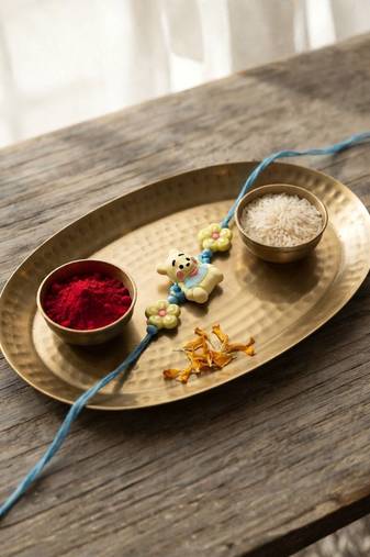 kids rakhi with roli chawal and raksha bandhan cards