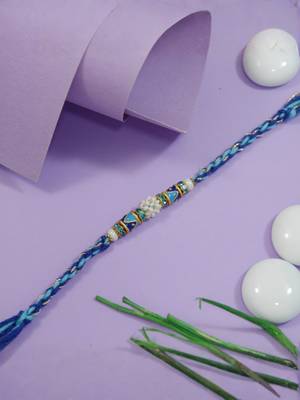 designer blue rakhi with roli chawal and raksha bandhan cards 1