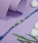 designer blue rakhi with roli chawal and raksha bandhan cards
