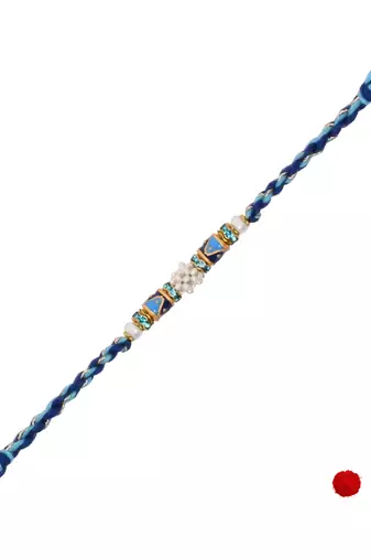 designer blue rakhi with roli chawal and raksha bandhan cards