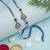 evil eye rakhi with roli chawal and raksha bandhan cards