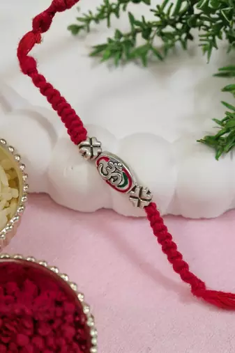 designer om rakhi with roli chawal and raksha bandhan cards