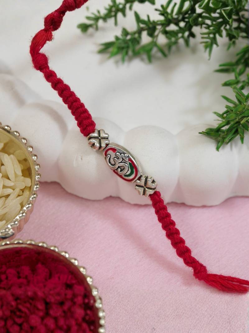 designer om rakhi with roli chawal and raksha bandhan cards