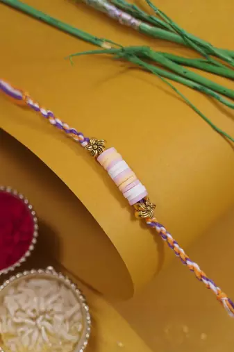 clay kids rakhi with roli chawal and raksha bandhan cards