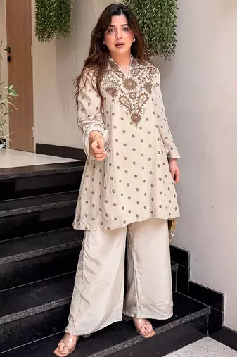 Cream silk crepe heavy thread embroidery work kurta with palazzo