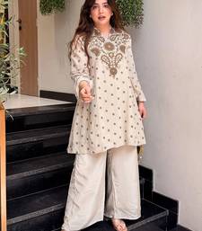 Cream silk crepe heavy thread embroidery work kurta with palazzo