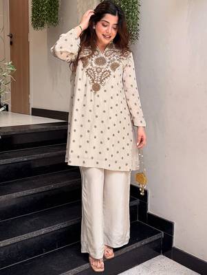 Cream silk crepe heavy thread embroidery work kurta with palazzo 3