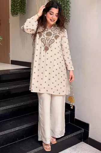 Cream silk crepe heavy thread embroidery work kurta with palazzo