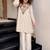 Cream silk crepe heavy thread embroidery work kurta with palazzo