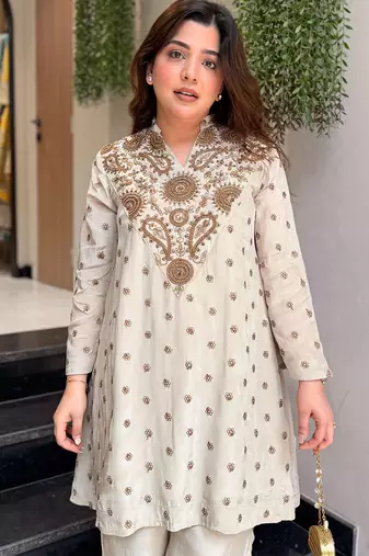 Cream silk crepe heavy thread embroidery work kurta with palazzo