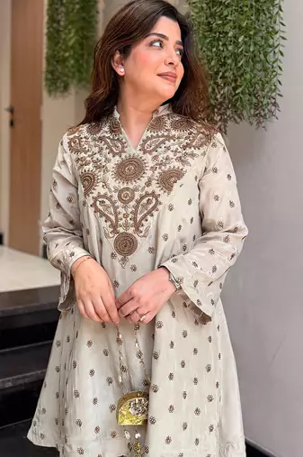 Cream silk crepe heavy thread embroidery work kurta with palazzo