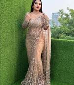 Cream butterfly net embroidered saree with unstitched blouse