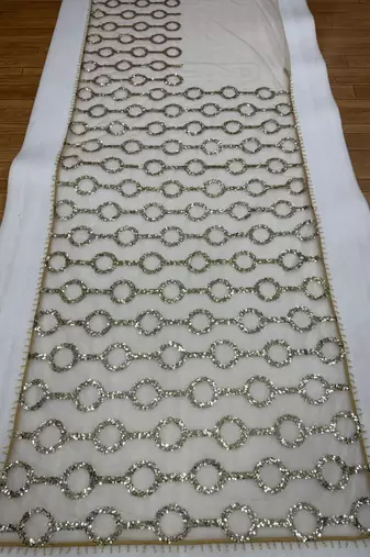 Cream butterfly net embroidered saree with unstitched blouse