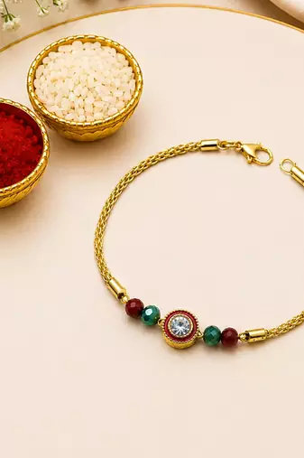 Luxury crystal rakhi with red & green beads for raksha bandhan