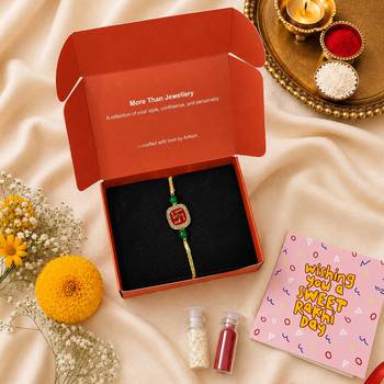 Gold-tone swastik designer rakhi with green beads 2