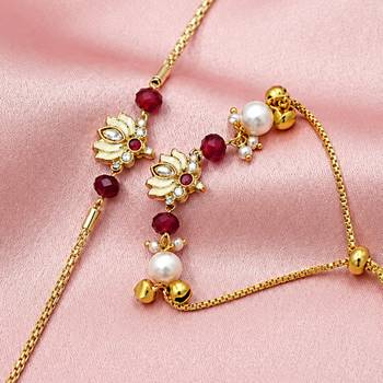 Gold-plated lotus bhaiya bhabhi rakhi set with red beads 3