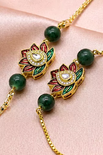 Lotus designer bhaiya bhabhi rakhi set with green beads