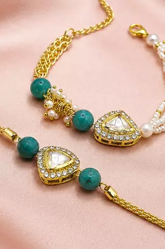 Gold-plated teardrop kundan bhaiya bhabhi rakhi set