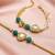 Gold-plated teardrop kundan bhaiya bhabhi rakhi set