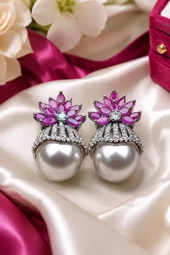 Rhodium finish ruby and pearl ad earrings