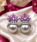 Rhodium finish ruby and pearl ad earrings
