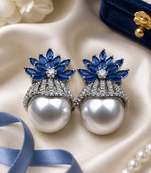 Rhodium finish sapphire and pearl ad earrings