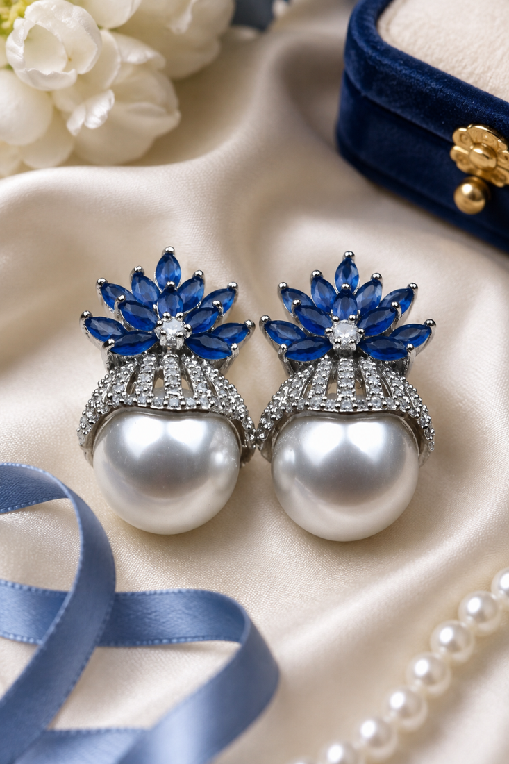 Rhodium finish sapphire and pearl ad earrings