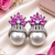 Rhodium finish ruby and pearl ad earrings