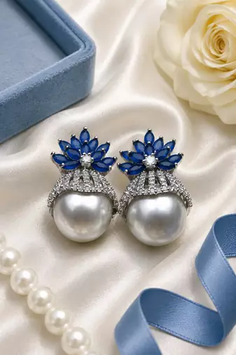 Rhodium finish sapphire and pearl ad earrings
