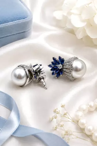 Rhodium finish sapphire and pearl ad earrings
