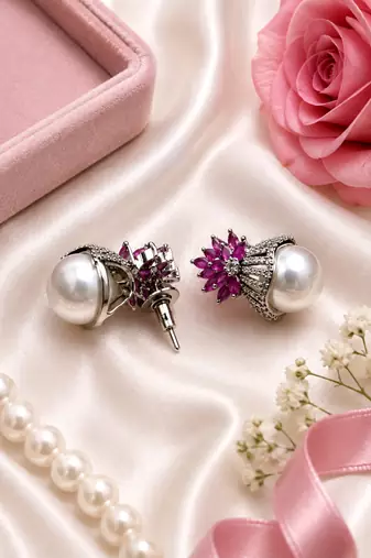 Rhodium finish ruby and pearl ad earrings
