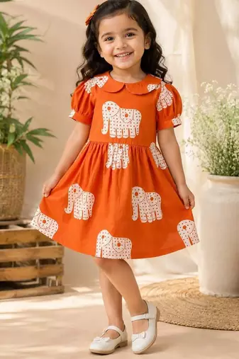 Orange cotton block printed dress for girl
