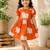 Orange cotton block printed dress for girl