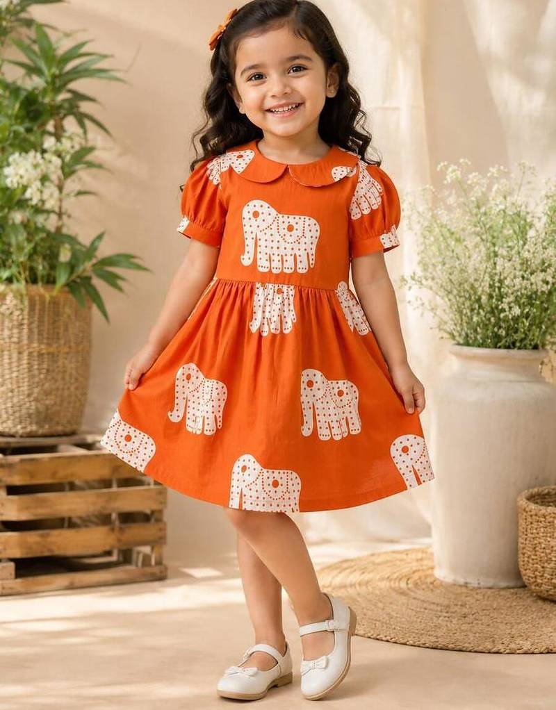 Orange cotton block printed dress for girl