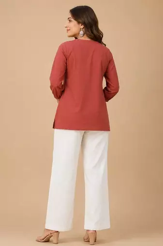 Peach embroidered short tunic kurti with off-white bottom set