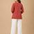 Peach embroidered short tunic kurti with off-white bottom set