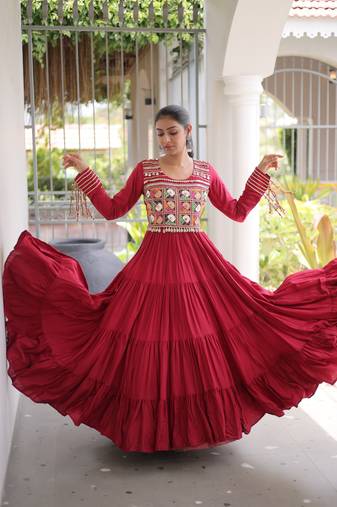 Maroon rayon kutchi gamthi thread embroidered mirror work  flair gown