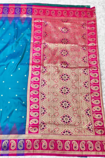 rama zari woven banarasi silk blend traditional saree with blouse piece